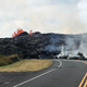 Fissure 6 builds a lava berm across Pohoiki Road.